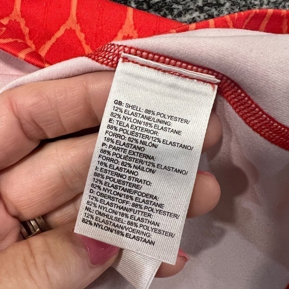 THE NORTH FACE orangish red exercise top with cross back shoulder straps - Picture 9 of 13